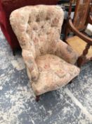 A VICTORIAN STYLE BUTTON BACK CHAIR