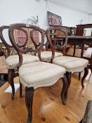 A SET OF FOUR VICTORIAN BALLOON BACKED CHAIRS
