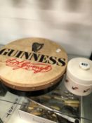 A VINTAGE GUINESS TOUCAN LIDDED JAR AND A GUINESS DRUM.
