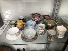 A COLLECTION OF CABINET CUPS AND SAUCERS TOGETHER WITH AN EASTBOURNE JUG AND THREE OTHERS