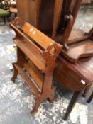 A ANTIQUE OAK BOOK STAND AND A DESK LAMP