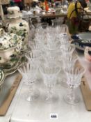 A SET OF 18 WATERFORD CRYSTAL WINE GLASSES.