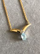 AN AQUAMARINE AND DIAMOND NECKLACE. THE NECKLACE STAMPED 9ct DIA, ASSESSED AS 9ct GOLD. LENGTH