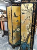 AN ORIENTAL LACQUER DECORATED FOUR FOLD SCREEN