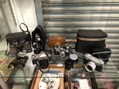 CHINON, YASHICA AND OTHER CAMERAS, A GREENKAT MICROSCOPE TOGETHER WITH TWO PAIRS OF BINOCULARS