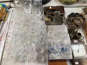 THREE SPIRIT DECANTERS, DRINKING GLASS, ELECTROPLATE, KITCHEN KNIVES, A CLOCK, ETC.