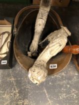 A COPPER COAL SCUTTLE, A BRASS SHOVEL TOGETHER WITH TWO PAIRS OF CARVED FURNITURE LEGS