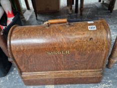 A OAK CASED SINGER SEWING MACHINE