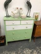 A GREEN AND WHITE PAINTED CHEST OF TWO SHORT AND THREE LONG DRAWERS