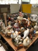 A COLLECTION OF DUCK, DOG AND OTHER FIGURES TOGETHER WITH AN OIL LAMP AND A FLORAL APPLIED TEA POT