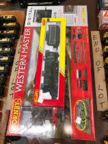 A HORNBY DUBLO DIGITAL WESTERN MASTER BOXED TRAIN SET TOGETHER WITH A BOXED FLYING SCOTSMAN WITH