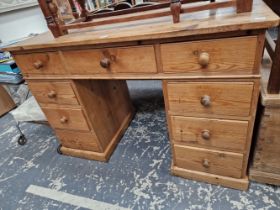 AN ANTIQUE PINE PEDESTAL DESK