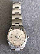 A VINTAGE ROLEX OYSTER PERPETUAL WRISTWATCH WITH 30 mm STAINLESS STEEL CASE AND ORIGINAL STRAP.
