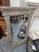 AN ANTIQUE STYLE WALL MIRROR