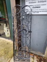 A PAIR OF WROUGHT IRON GATES.