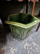 AN ANTIQUE GREEN GLAZED POTTERY PLANTER