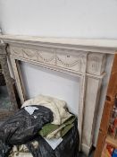 A 19th CENTURY PAINTED FIRE SURROUND.