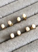 FOUR PAIRS OF 9ct GOLD AND OPAL STUD EARRINGS. GROSS WEIGHT 2.94grms.