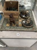 A CAST IRON BEAR MONEY BOX, A CAST METAL CHESS SET AND TWO WALL BOSSES.