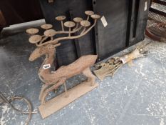 A SET OF FIRE IRONS, A WROUGHT IRON DEER FORM CANDLE STAND AND A TALL PLANT STAND