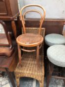 A BENTWOOD CHAIR AND A RATTAN CHAIR