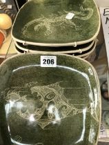 FIVE BONCHURCH POTTERY SQUARE PLATES SCRATCH DECORATED WITH ANIMALS THROUGH AN OLIVE GROUND