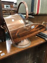 A VICTORIAN COPPER COAL SCUTTLE