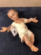 A FRENCH PLASTER SCULPTURE OF THE INFANT JESUS.