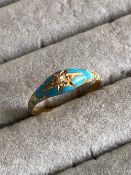 AN ANTIQUE TURQUOISE ENAMELLED AND OLD CUT DIAMOND RING. UNHALLMARKED, ASSESSED AS 15ct GOLD. FINGER