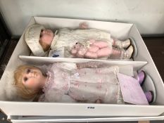 A PAIR OF LEONARDO COLLECTION BISQUE HEADED DOLLS