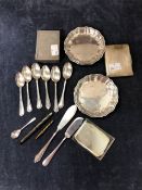A PAIR OF HALLMARKED SILVER SMALL PIN DISHES AND SIX SILVER SPOONS 194 gms. TOGETHER WITH A WHITE