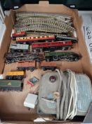 A COLLECTION OF OO GAUGE RAILWAY, ENGINES, COACHES AND TRACK.
