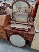 A MAHOGANY DRESSING TABLE AND A VITORIAN SWING MIRROR