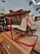 A VINTAGE SWALLOW ROCKING HORSE CHAIR