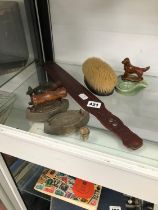 AN ANTIQUE TREEN PAGE TURNER, TWO MINIATURE IRONS, A WADE ASHTRAY ETC.