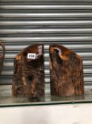 A PAIR OF YEW WOOD TREE TRUNK SECTION BOOKENDS