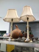 AN IRON FOUR NOZZLE CEILING LIGHT TOGETHER WITH A PAIR OF WHITE CANDLE COLUMN TABLE LAMPS