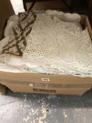A LARGE BOX OF VARIOUS LINENS AND TEXTILES.
