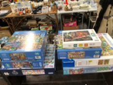 TWELVE BOXES OF 1000 PIECE JIGSAW PUZZLES.