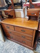 AN EDWARDIAN WALNUT DRESSING CHEST.