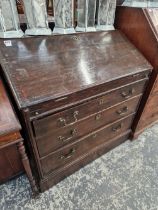 AN 18th CENTURY OAK BUREAU.