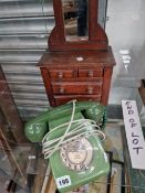 A GREEN TELEPHONE SET TOGETHER WITH A PINE MIRROR BACKED JEWELLERY CHEST