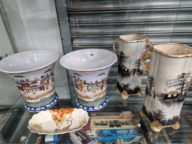 A CLARICE CLIFF DISH TOGETHER WITH TWO PAIRS OF VASES