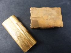 A VINTAGE GOLD PLATED DUNHILL LIGHTER, TOGETHER WITH A YELLOW METAL SNUFF BOX.