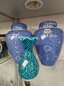 A PAIR OF ORIENTAL BLUE AND WHITE JARS AND COVERS TOGETHER WITH A MIDDLE EASTERN TURQUOISE GROUND