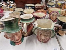 A COLLECTION OF BESWICK AND DOULTON CHARACTER JUGS.
