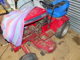 A TORO RIDE ON LAWN MOWER FOR RESTORATION.