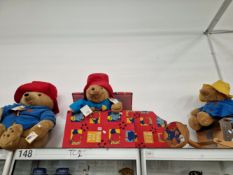 THREE PADDINGTON BEARS TOGETHER WITH A BOX, CHAIR AND A STOOL
