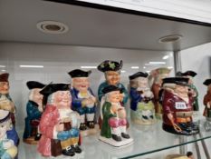 A COLLECTION OF TWELVE VARIOUS TOBY JUGS
