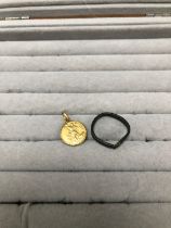 A ROMAN BRASS RING DEPICTING A SERPENT, AND A 750 STAMPED PENDANT OF ST MICHAEL ARCHANGEL,